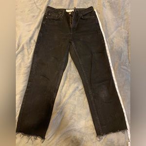 In good condition, worn, thick denim Topshop black wash jeans